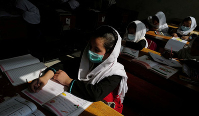 Girls attend a class in Kabul